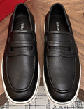 Salvatore Ferragamo Black Loafers with White Soles — hero