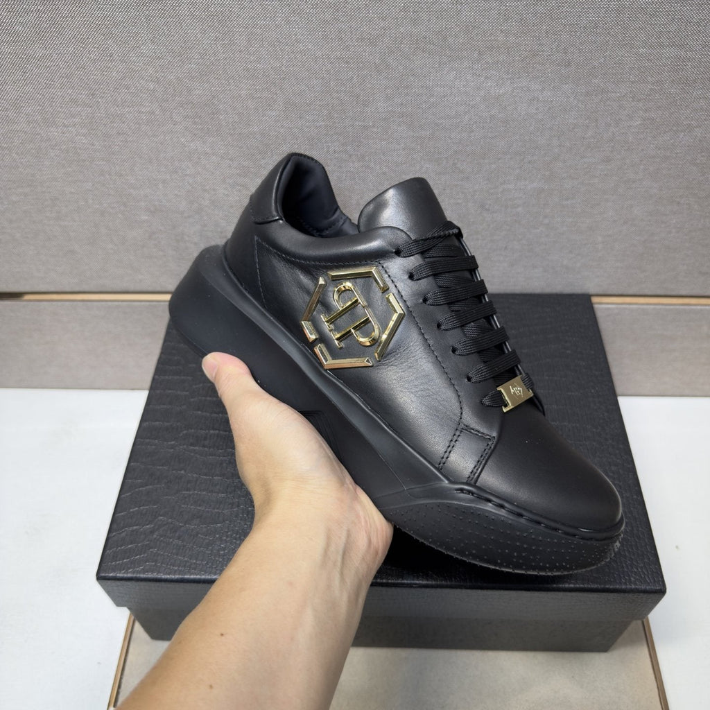 Philipp Plein Black Gold-Accent Sneakers — model
