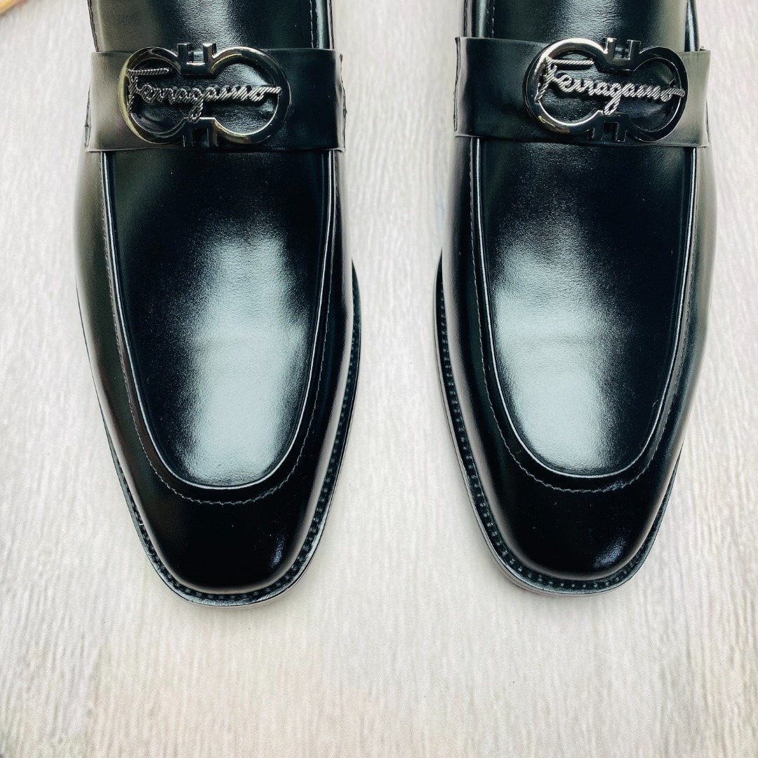 Ferragamo Black Metal-Accent Loafers — detail