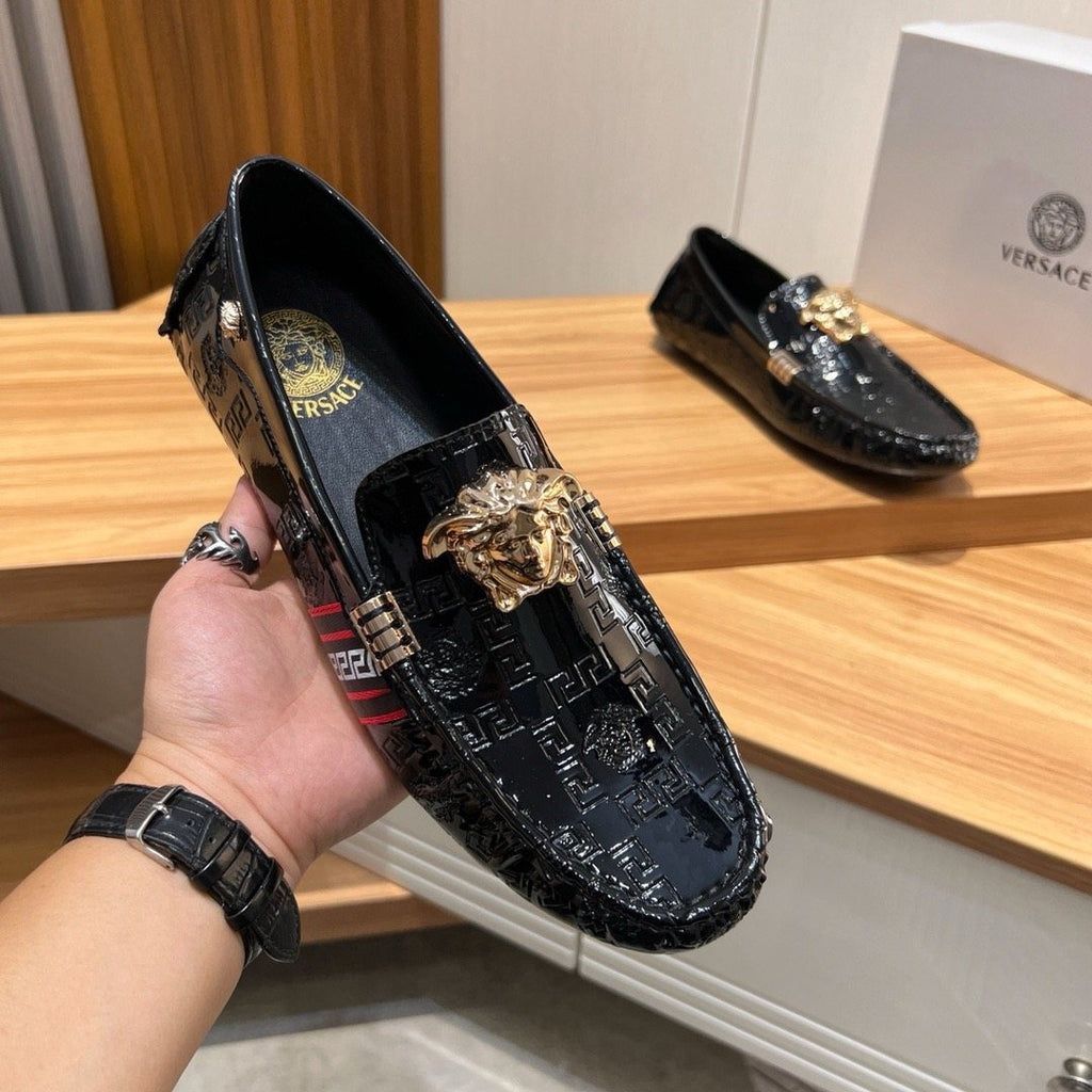 Versace Black Patterned Loafers with Gold-Tone Ornament — model