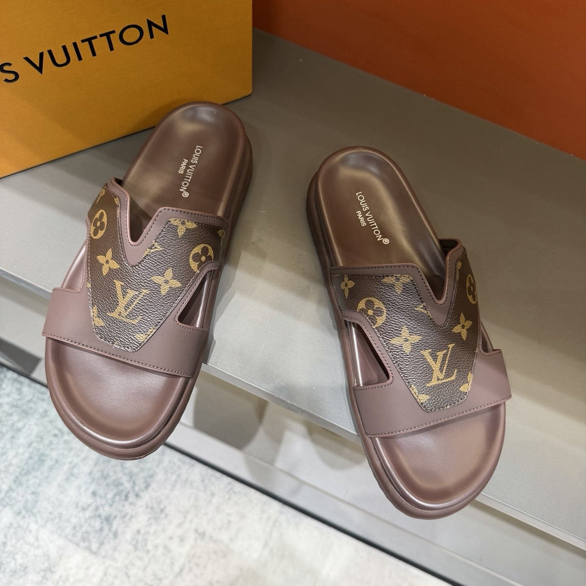 Louis Vuitton Oasis Cutout Slide Sandals — model