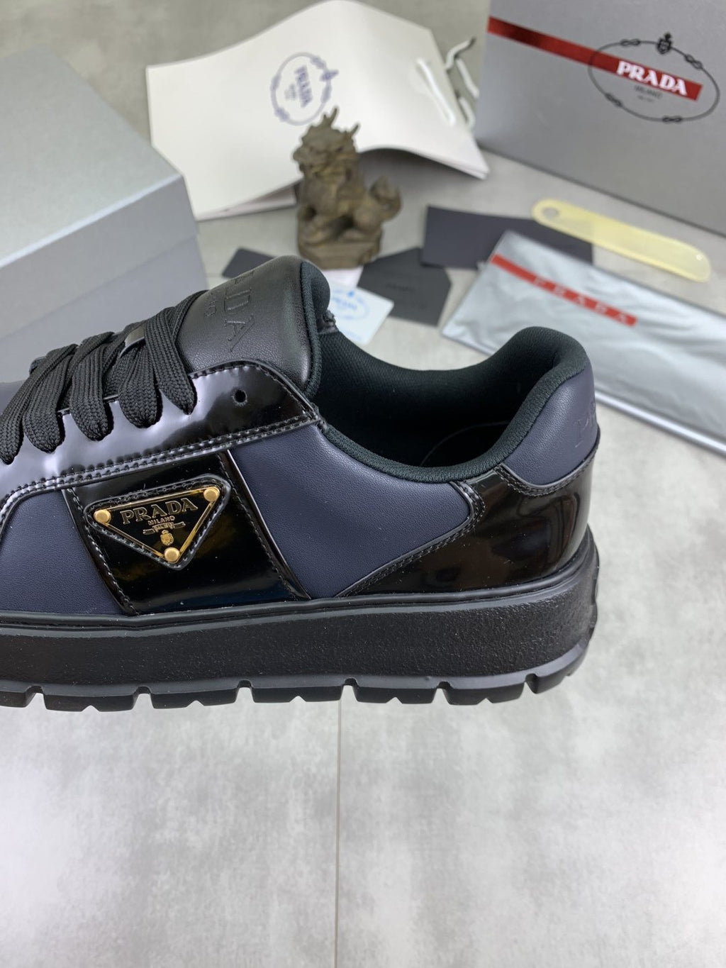 Prada Paneled Lug-Sole Low-Top Sneakers — detail