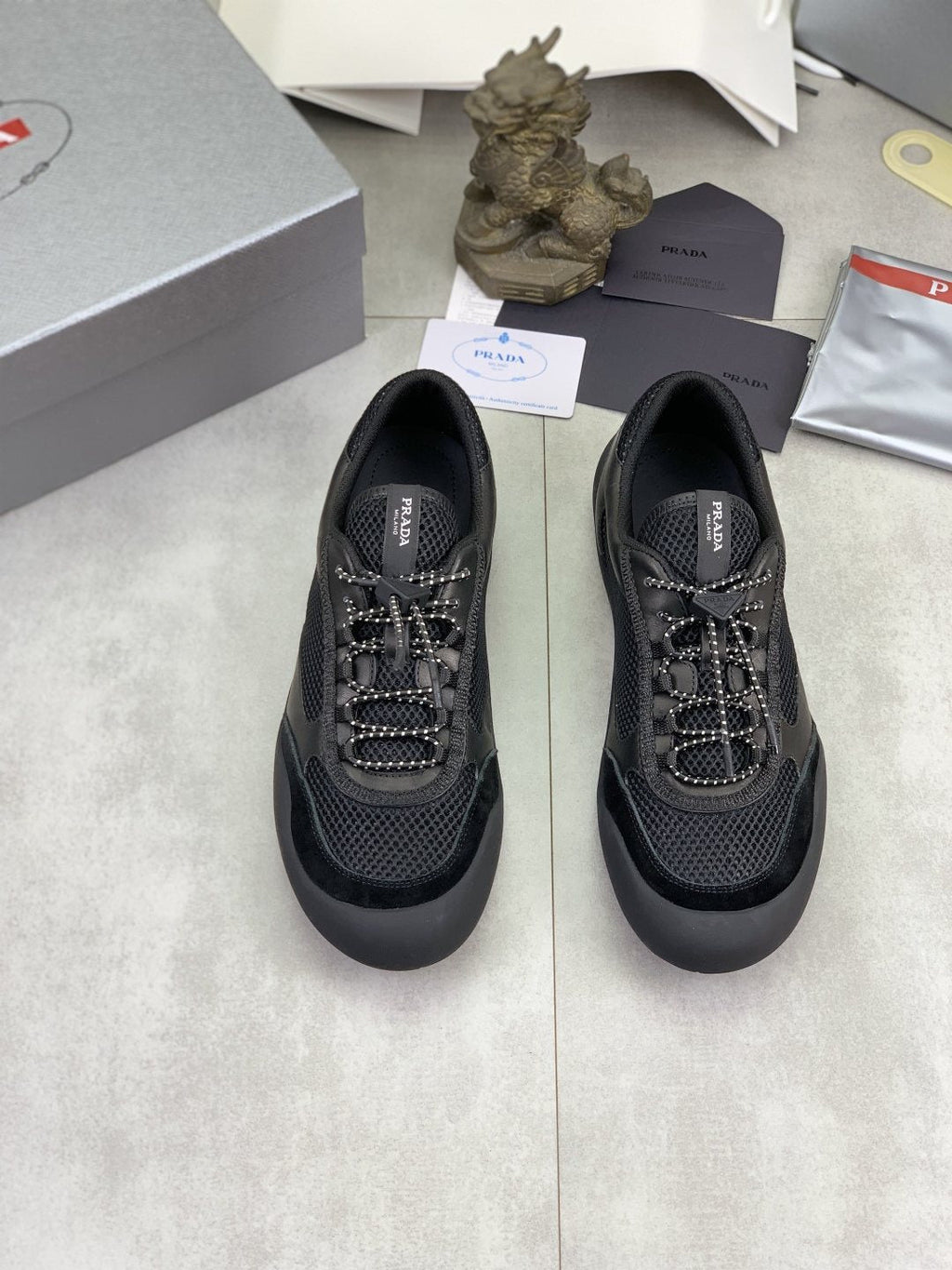 Prada Paneled Low-Top Sneakers — hero