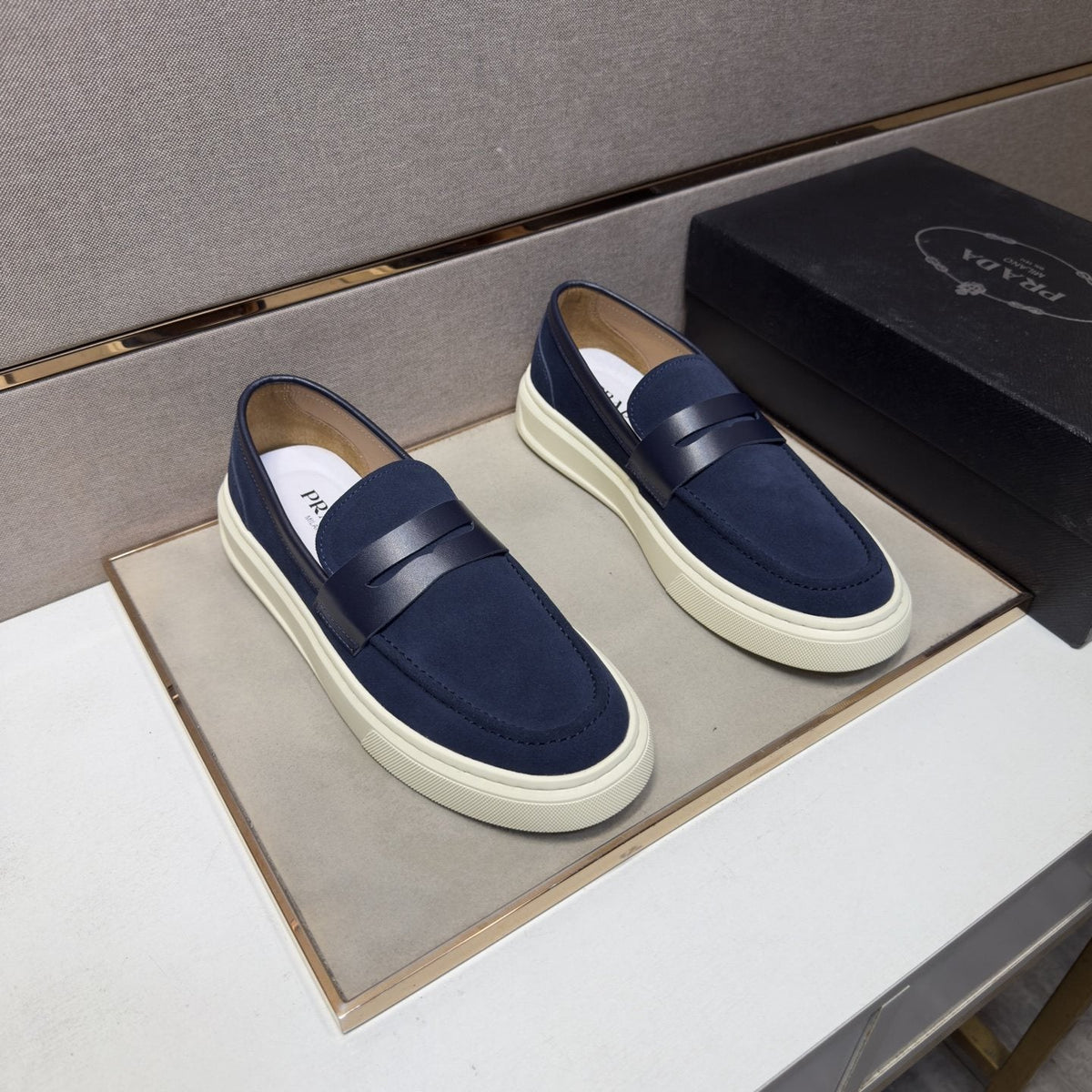 Prada Men's Penny Loafers with White Soles — front