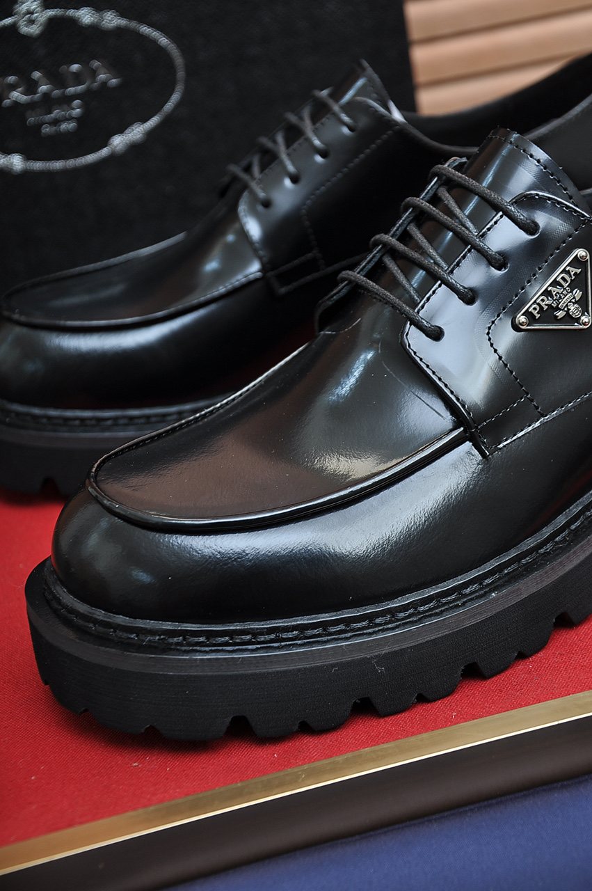 Prada Lug-Sole Lace-Up Derby Shoes — detail
