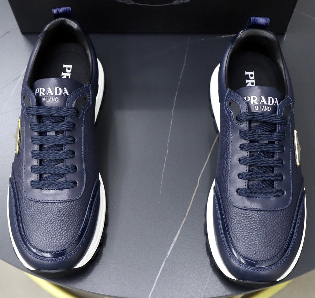 Prada Paneled Lace-Up Sneakers — hero
