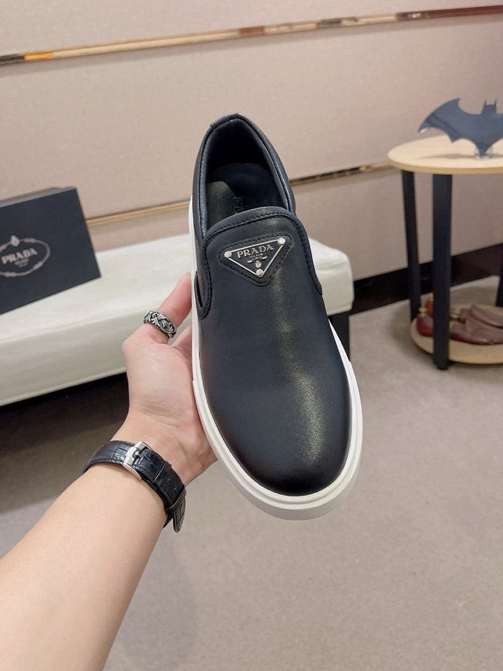 Prada Triangle-Patch Slip-On Shoes — front