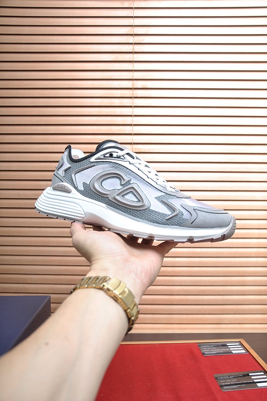 Dior Paneled Lace-Up Sneakers — model