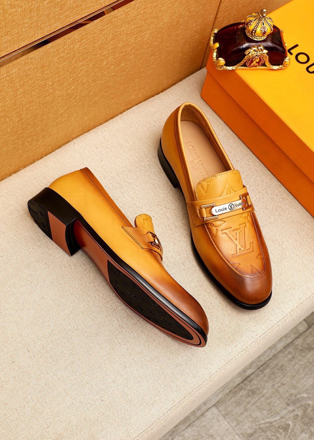 Louis Vuitton Embossed Metal-Bar Loafers — front